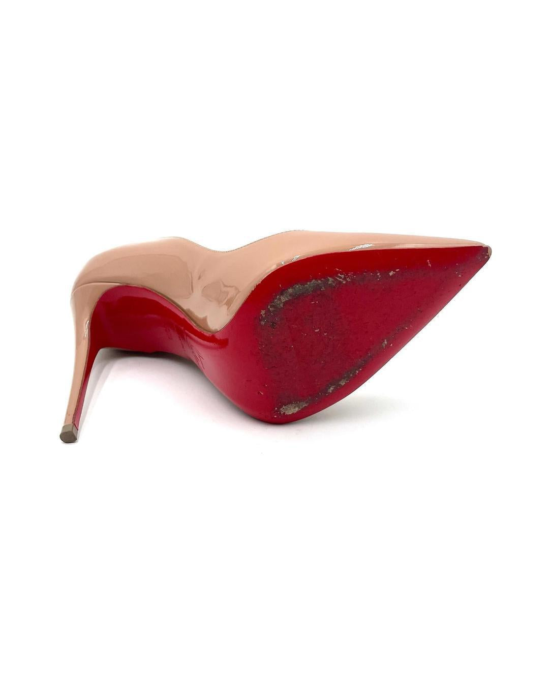 Christian Louboutin nude patent leather Pigalle 100 pumps with iconic red soles and pointed toes.