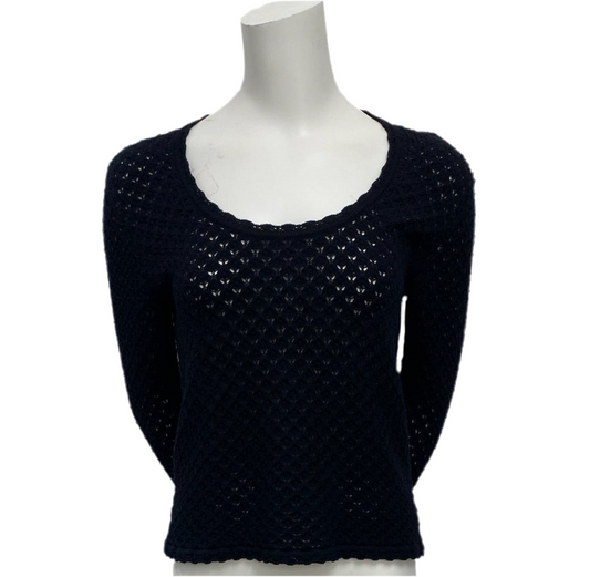 Dolce & Gabbana black knit long sleeve blouse, size M, with a scoop neck and open weave pattern.