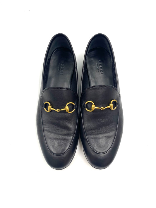 Gucci Black Jordaan Loafers size 37, classic leather loafers with gold Horsebit detail.