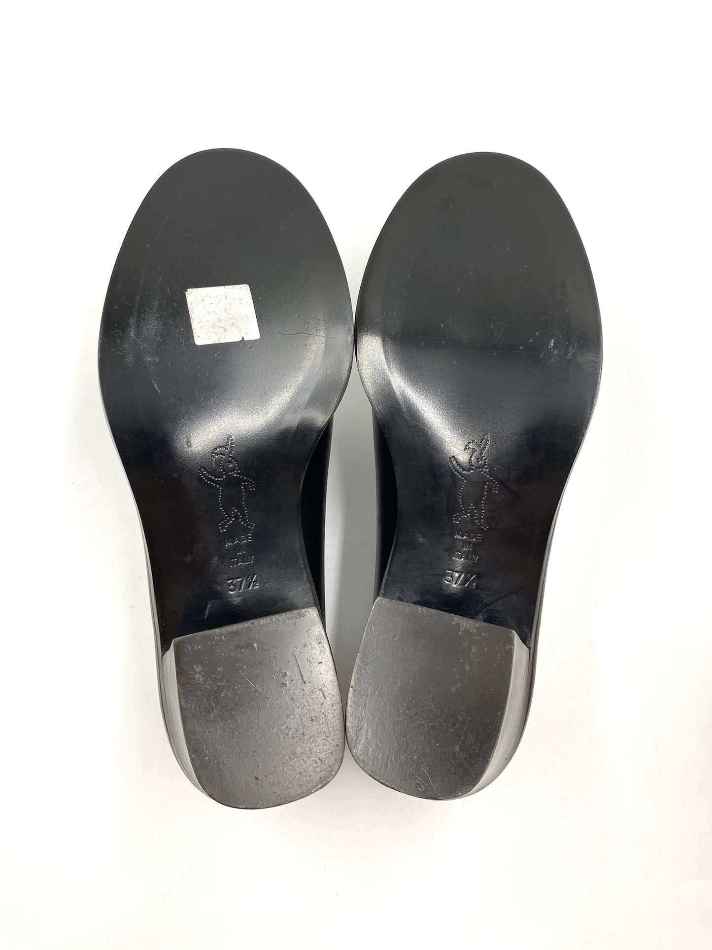 Marni black leather loafers, size 37.5, with block heels and exposed edging.