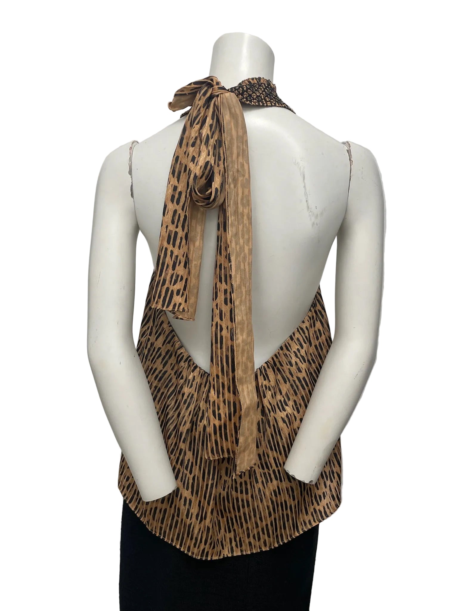 Alice & Olivia leopard print halter blouse, size M, with open-back tie detail on a mannequin.