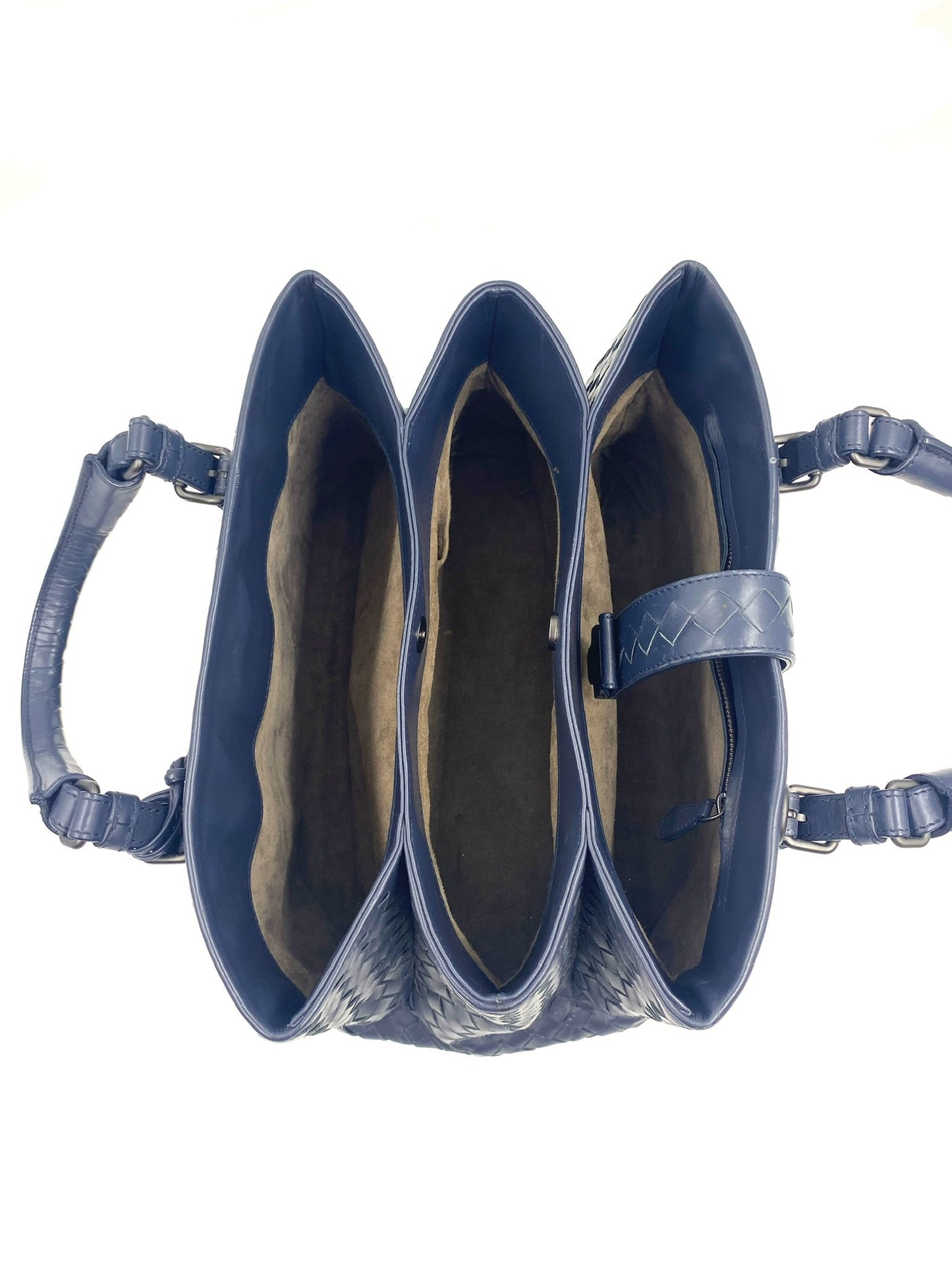 Bottega Veneta blue Intrecciato leather small Roma bag, top view showing three compartments.