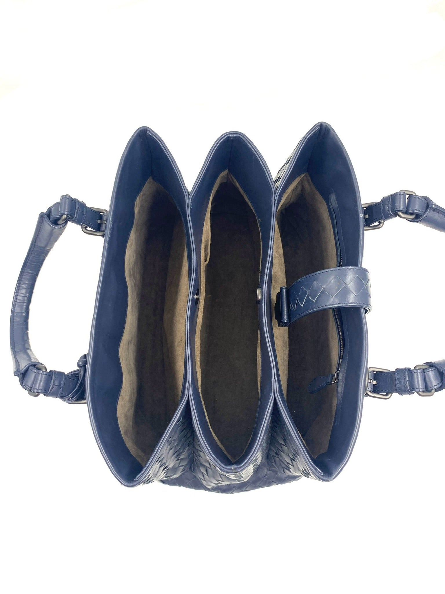 Bottega Veneta blue Intrecciato leather small Roma bag, top view showing three compartments.