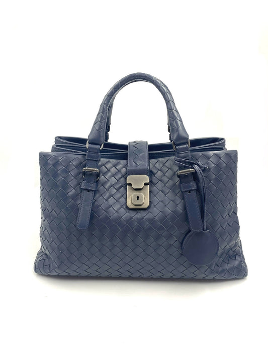 Bottega Veneta blue Intrecciato leather Small Roma bag with gunmetal hardware and padlock closure.