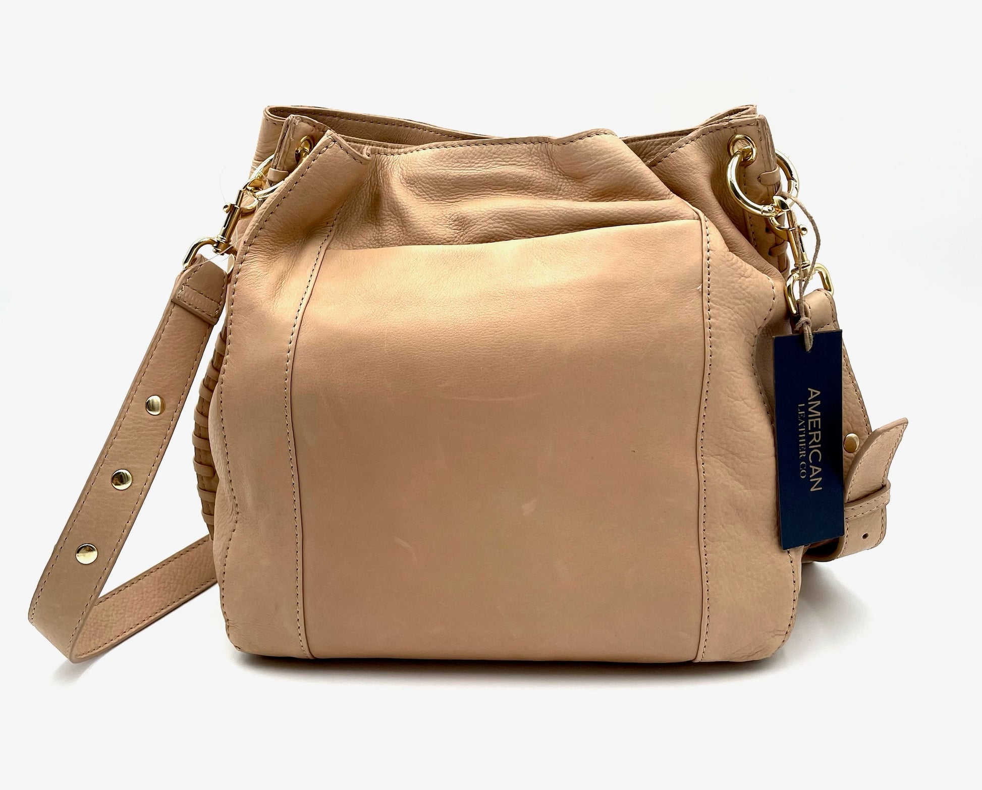 Beige leather American Co. shoulder bag with gold hardware, braided sides, and adjustable strap.