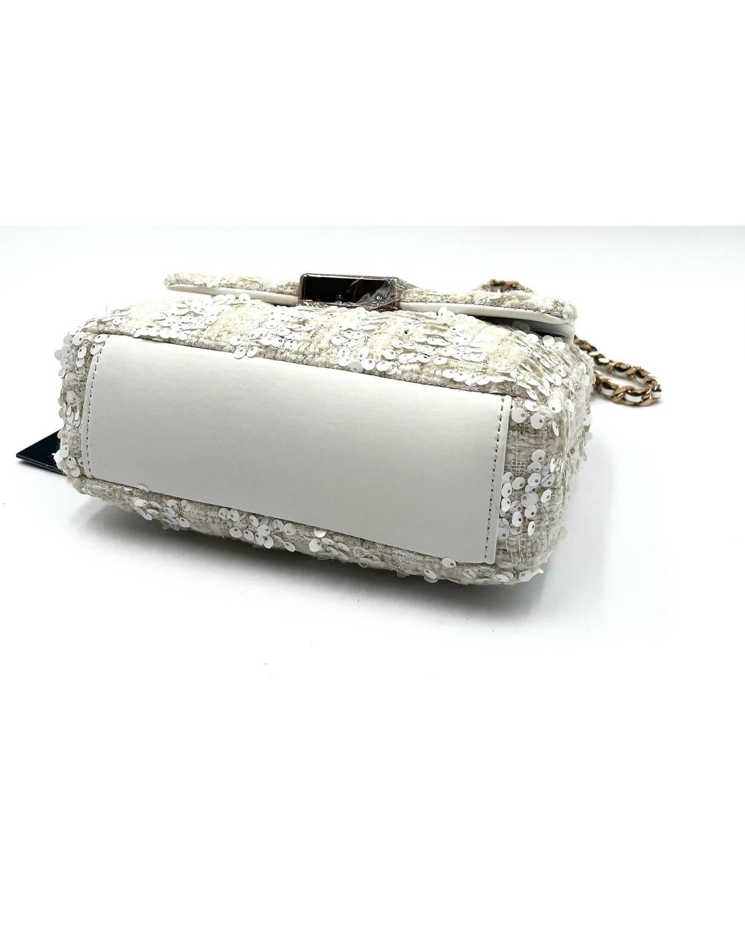 Cream Karl Lagerfeld Lafayette sequin crossbody bag with a smooth leather base and gold chain strap.