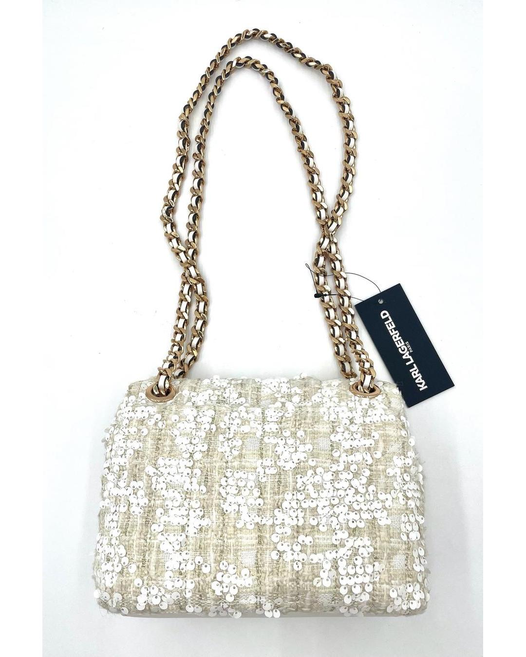 Karl Lagerfeld cream sequin crossbody bag with gold chain strap and hanging brand tag on a white background.