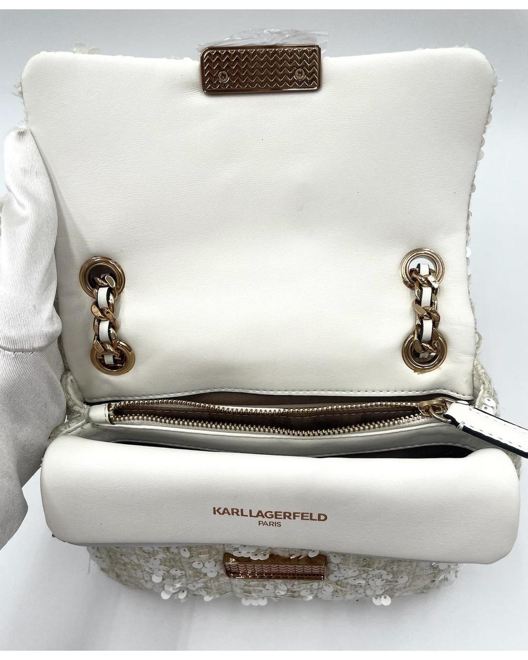 Open Karl Lagerfeld cream sequin chain bag with gold hardware, interior zip pocket, and branded leather lining.