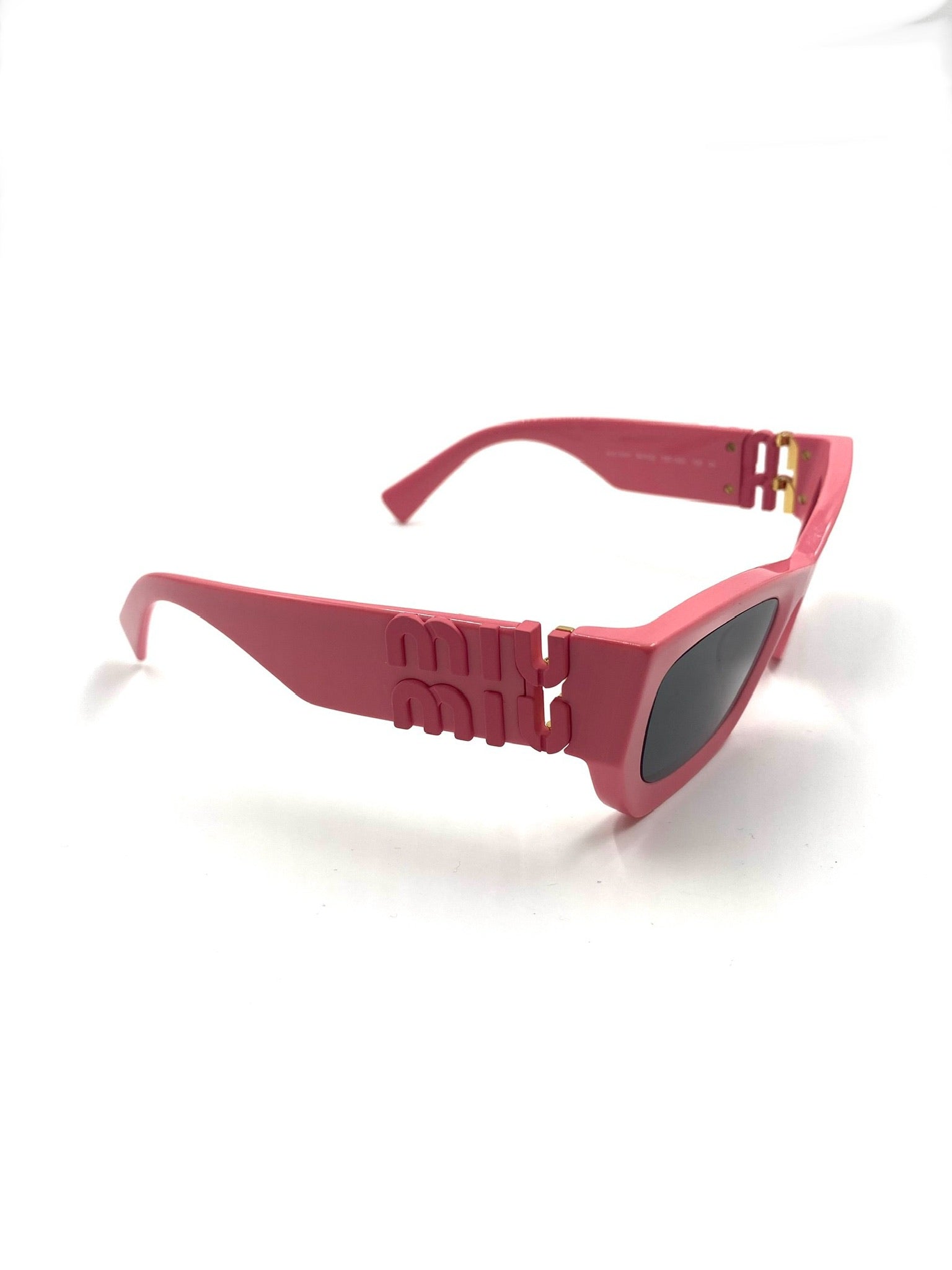 Miu Miu pink rectangular acetate sunglasses with grey tinted lenses and side logo lettering.