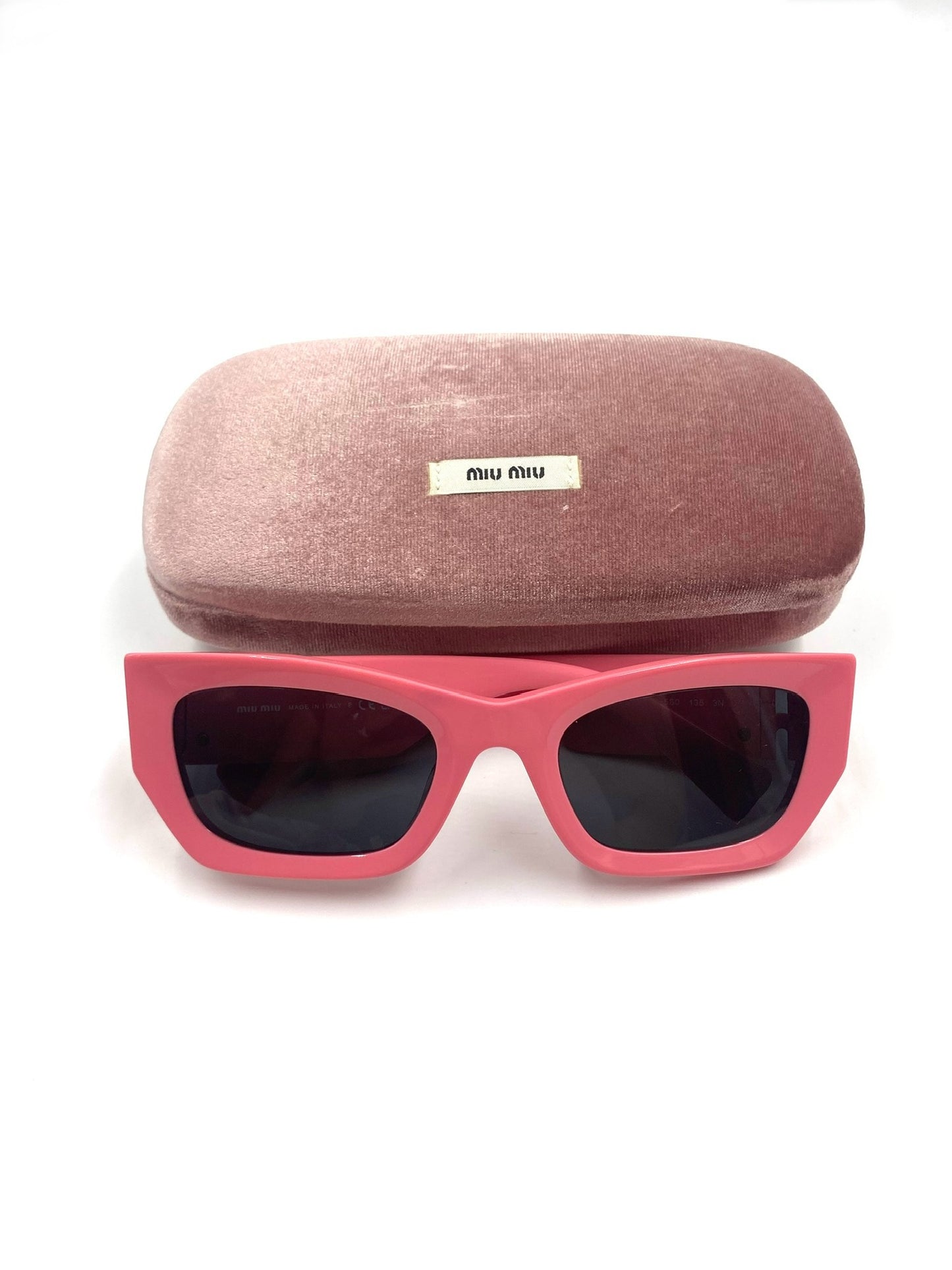 Miu Miu pink rectangular acetate sunglasses with grey tinted lenses and a velvet case.