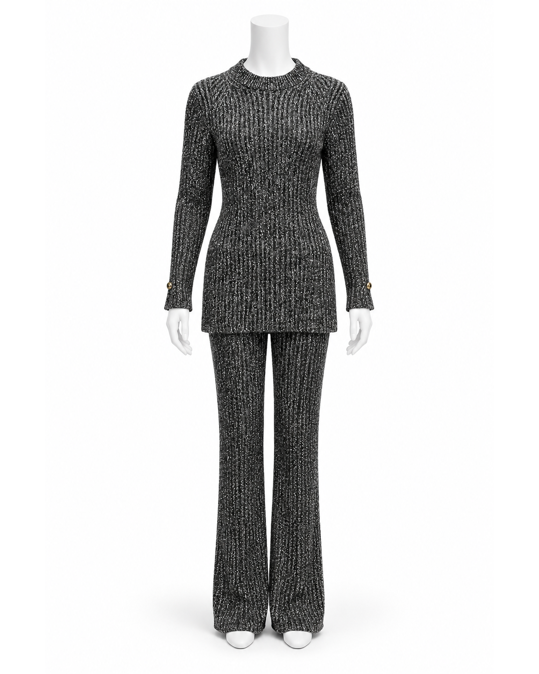 New St. John black and white ribbed knit sweater and wide-leg pant set, size L, on a mannequin.