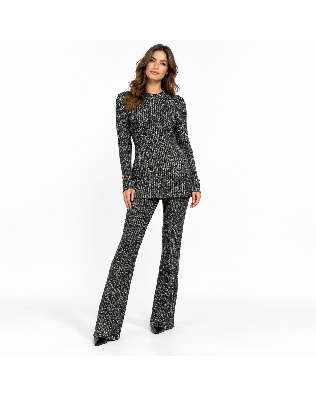 St. John black and white knit sweater and wide-leg pant set, size L, featuring a round neck and long sleeves.