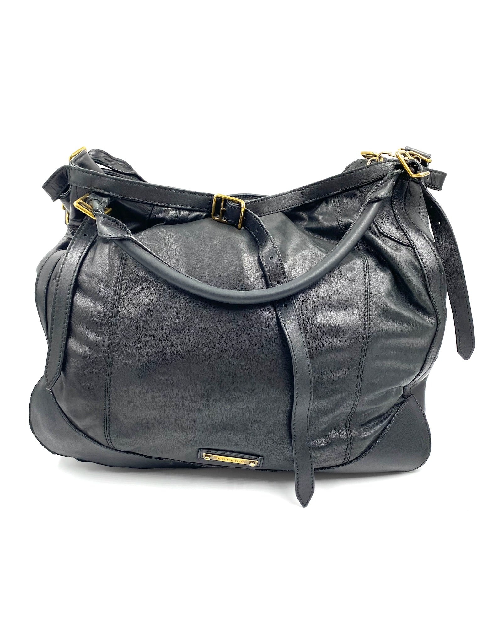 Burberry Black Large Leather Handbag with gold hardware, magnetic closure, and adjustable straps.