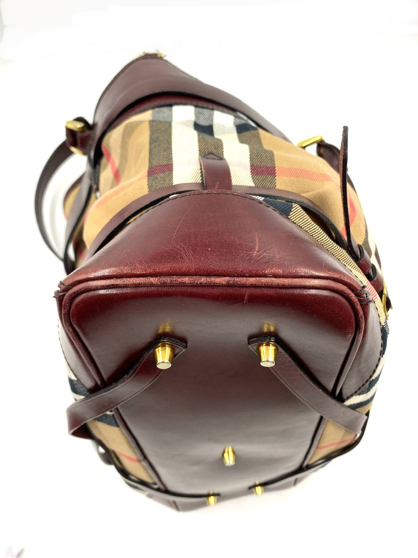 Burberry Burgundy Leather Bridle House Check Tote with brass links and buckle belt embellishments.