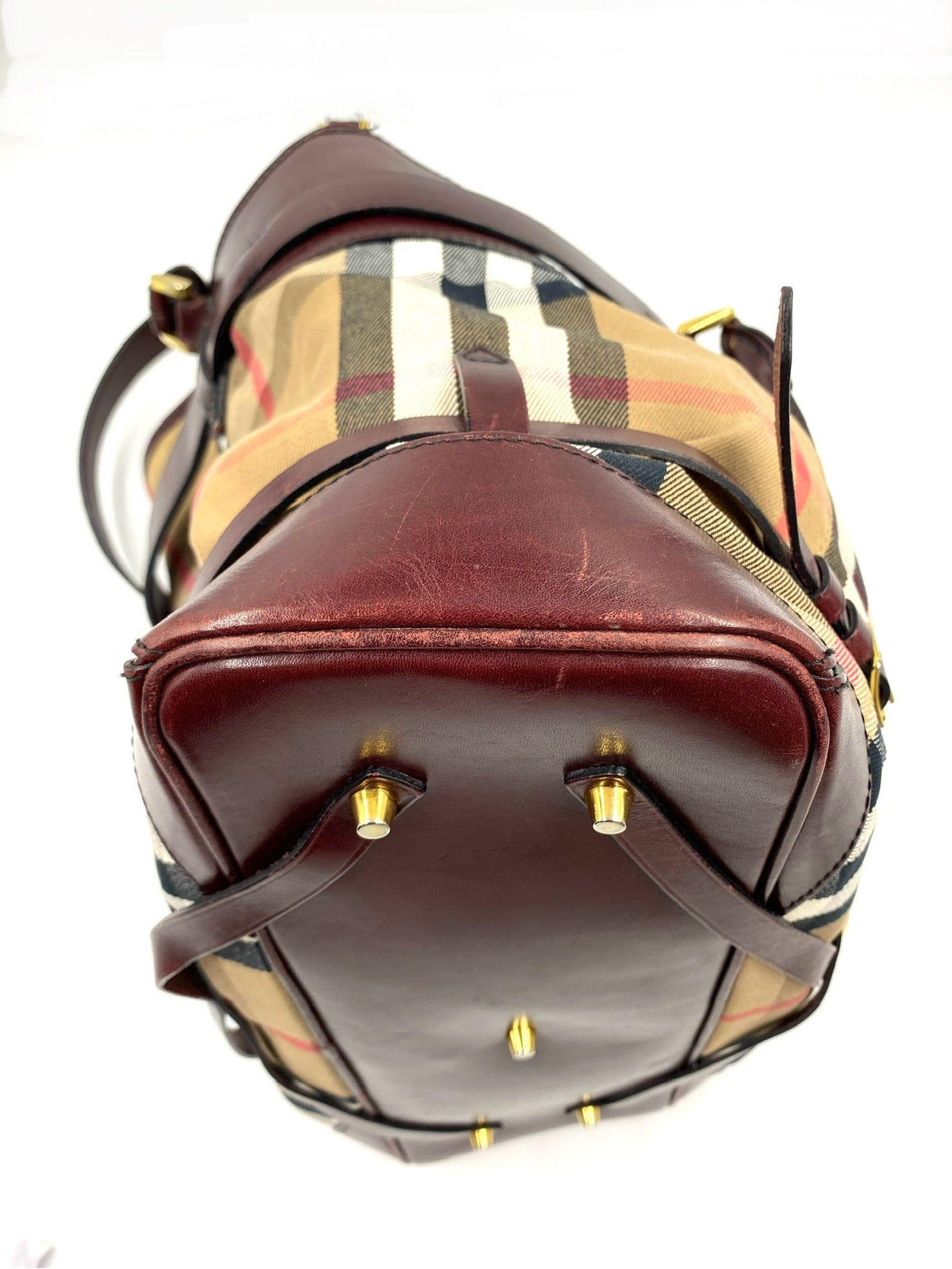 Burberry Burgundy Leather Bridle House Check Tote with brass links and buckle belt embellishments.