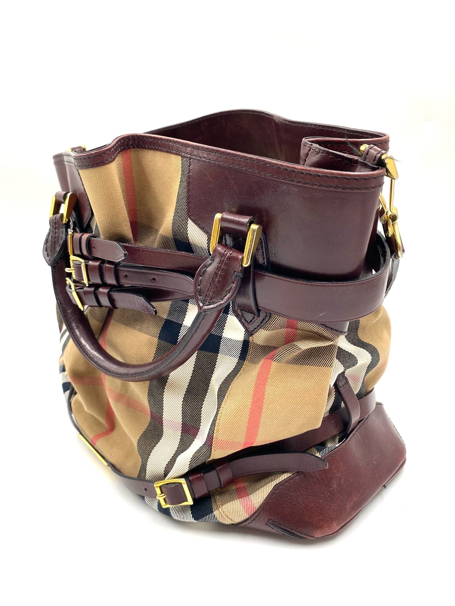 Burberry Burgundy Leather Bridle House Check Tote with rolled handles, brass links, and buckle embellishments.