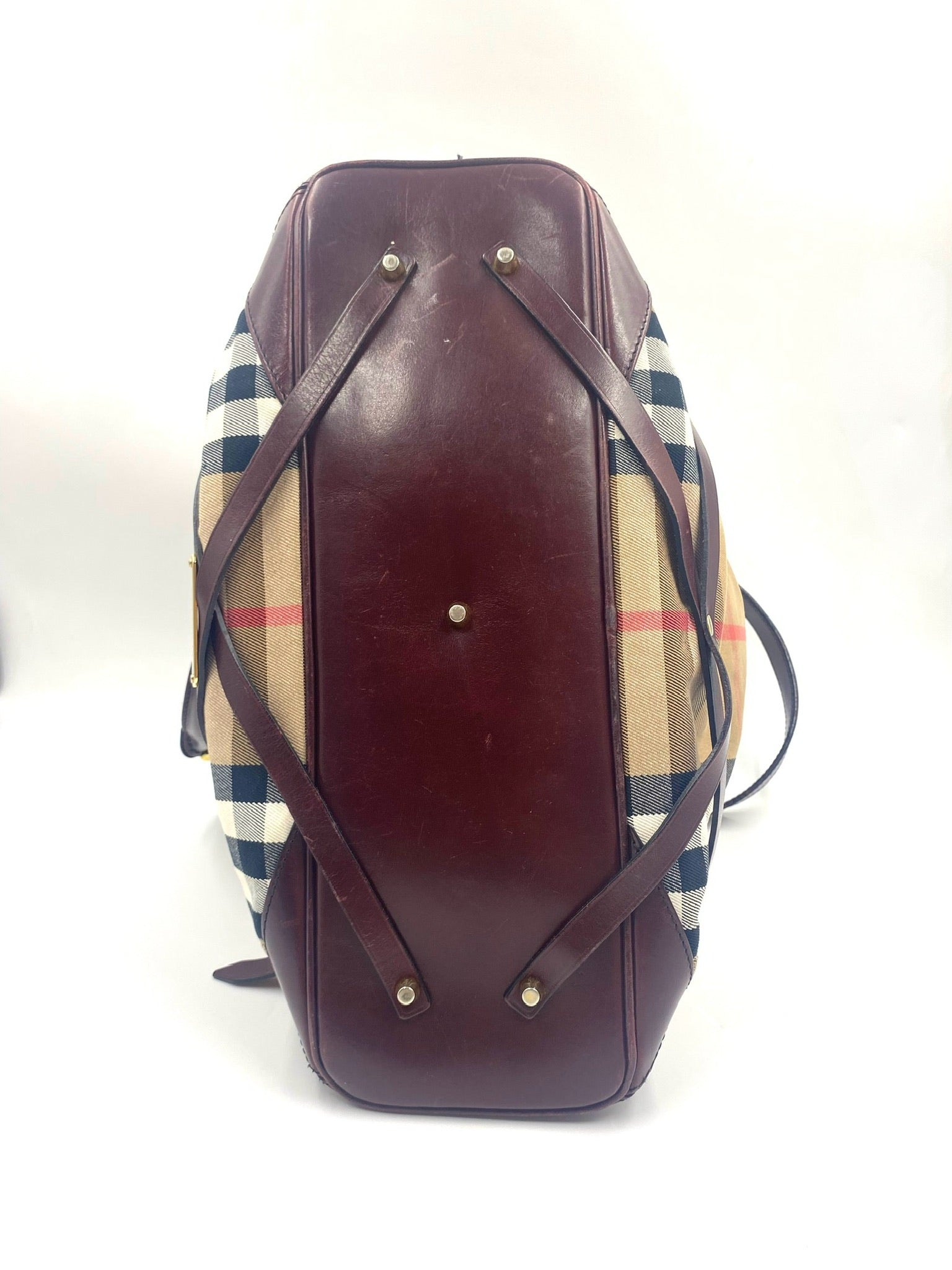 Burberry Burgundy Leather Bridle House Check Tote, bottom view showing leather base and check fabric.