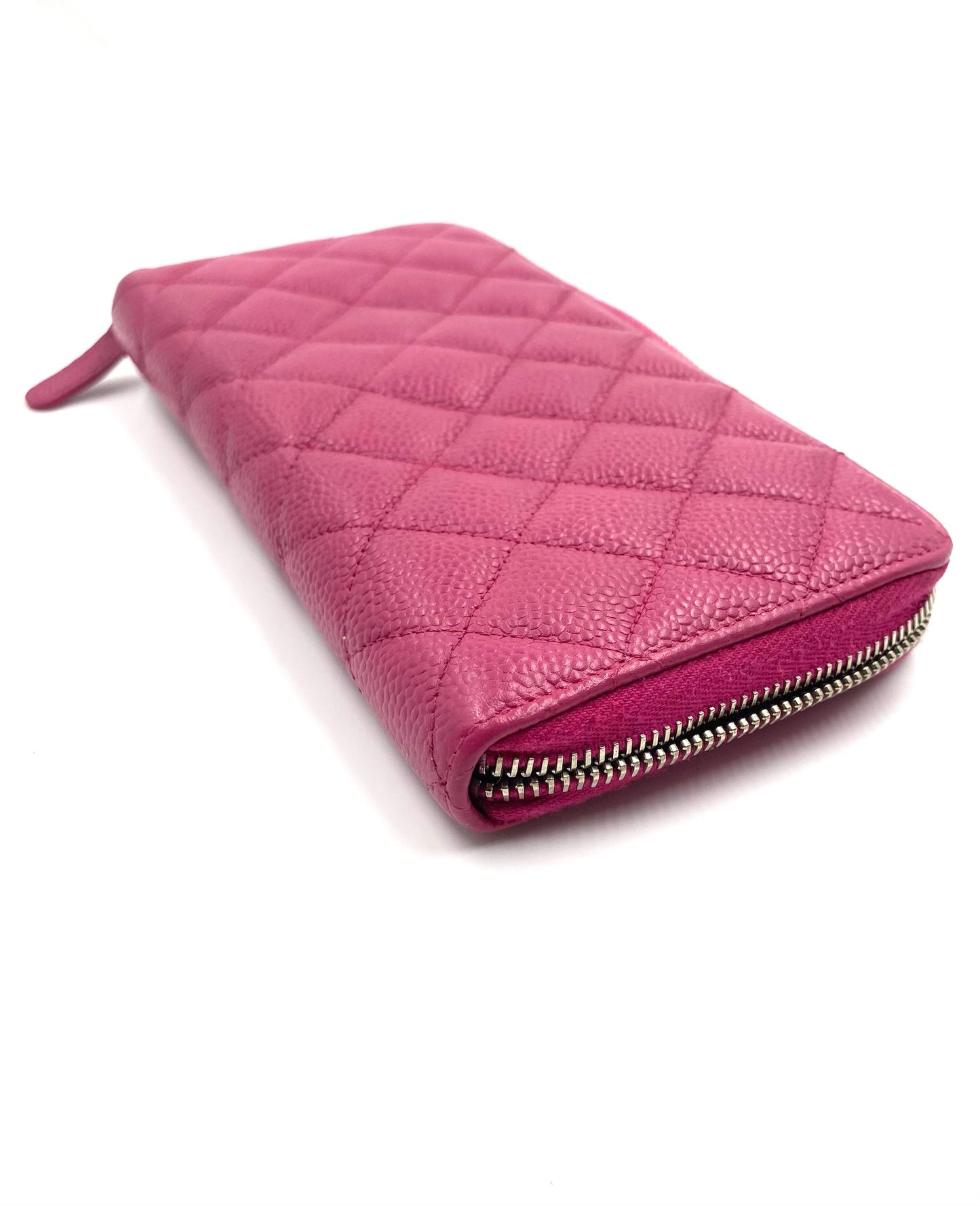 Chanel Pink Long Caviar Zip Wallet with quilted texture and silver hardware.
