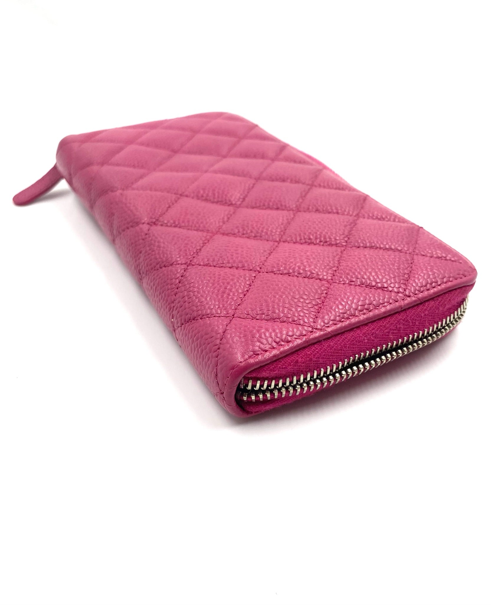 Chanel Pink Long Caviar Zip Wallet with quilted texture and silver hardware.