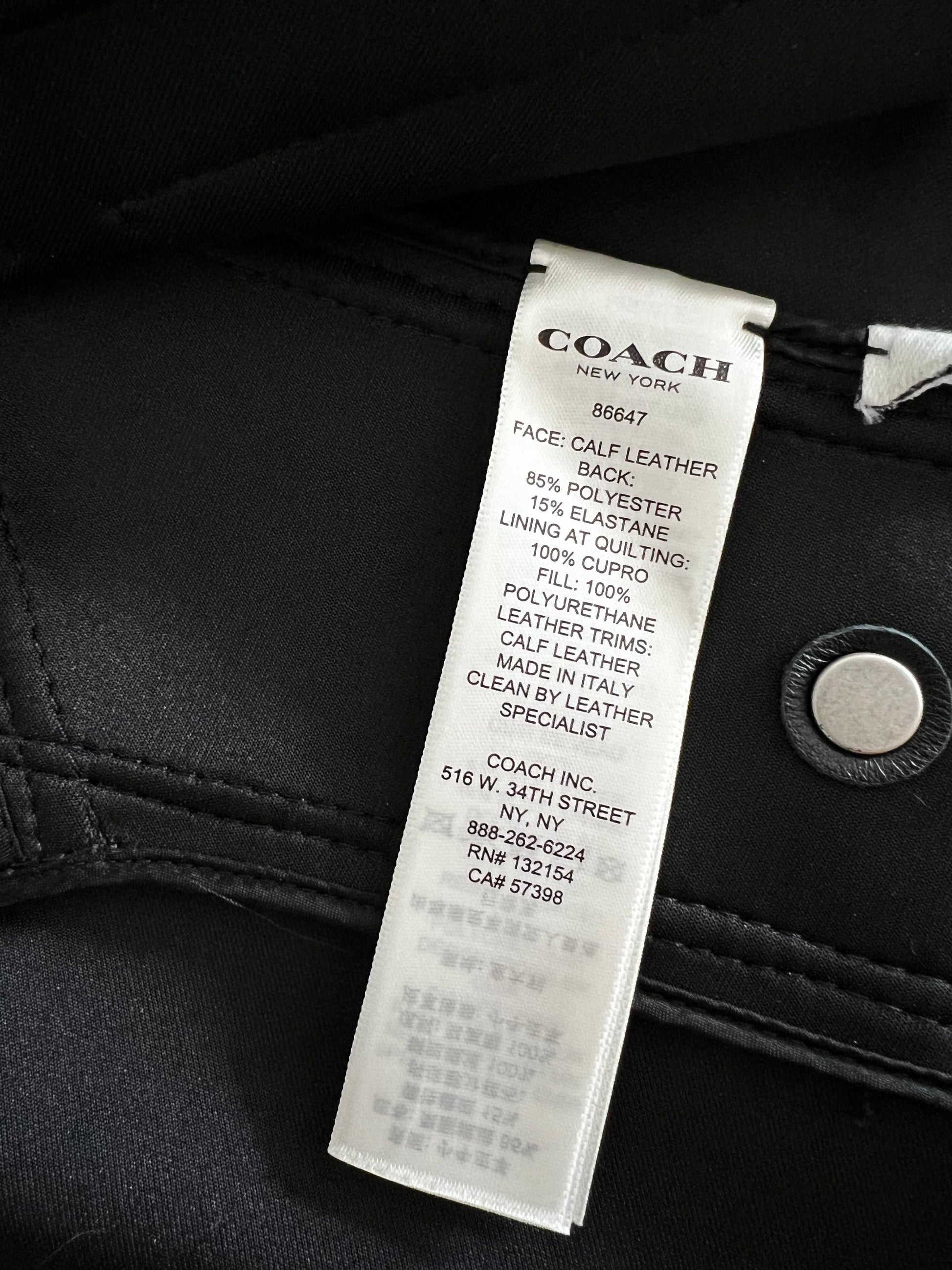 Coach 1941 black leather biker vest care tag with material and cleaning instructions.