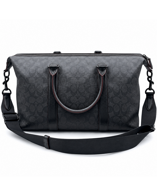 Coach black monogram coated canvas and calfskin Trekker 52 weekender duffle bag with top handles and shoulder strap.