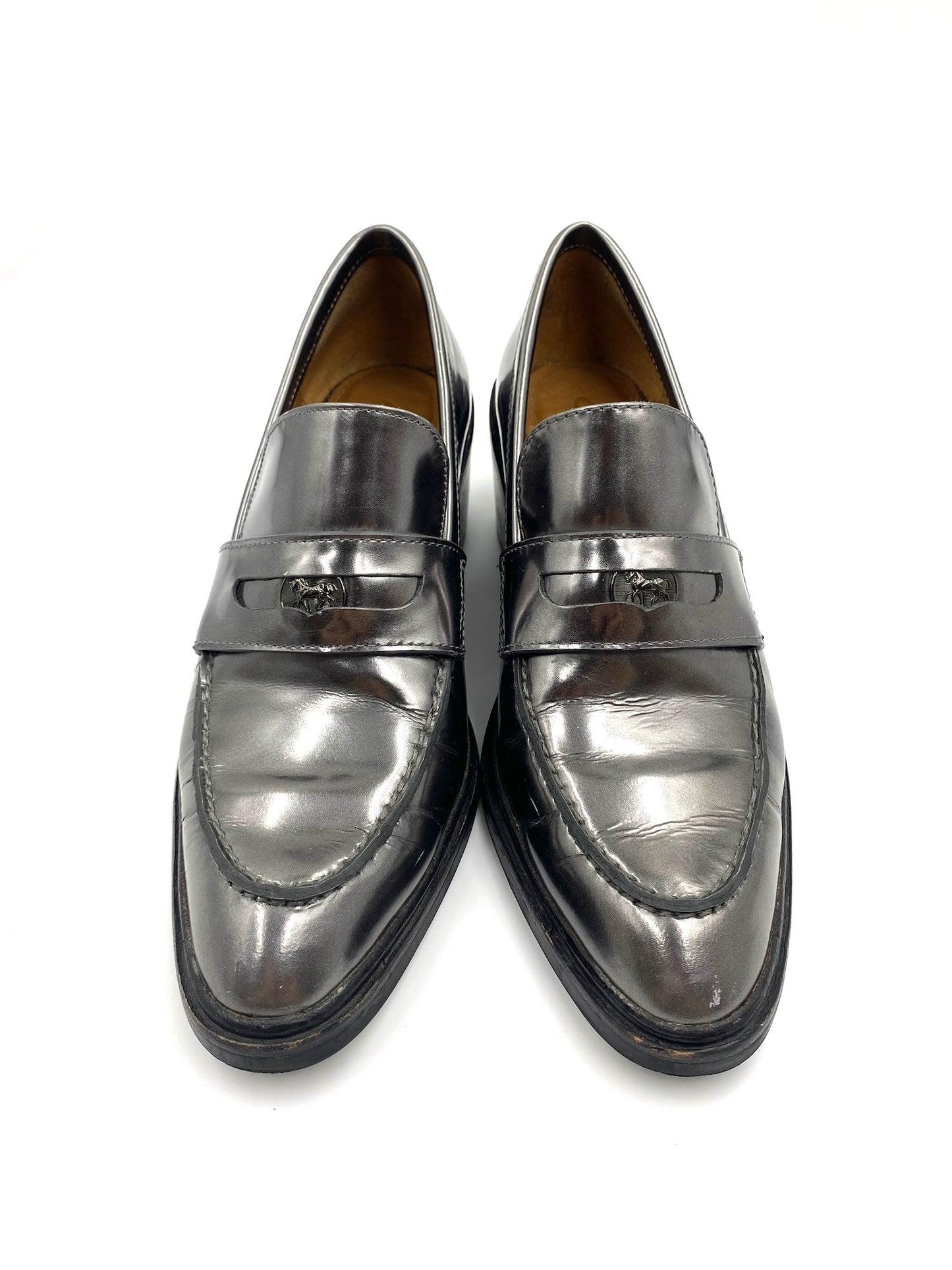 Coach Grey Metallic Loafers, size 8, with classic design and visible wear on the metallic leather.