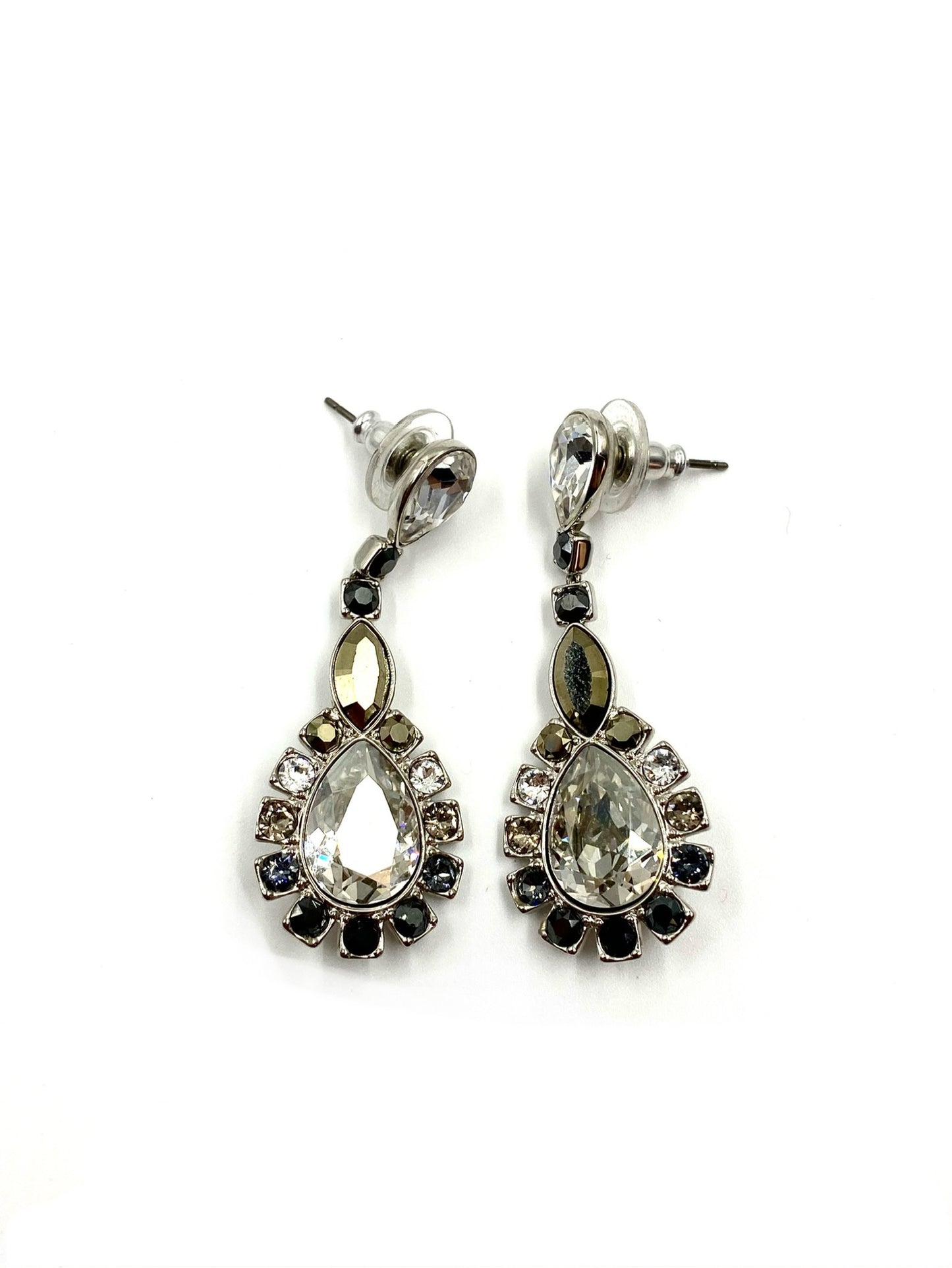 Silver-toned drop earrings with large clear cubic zirconia, surrounded by smaller onyx and crystal stones.