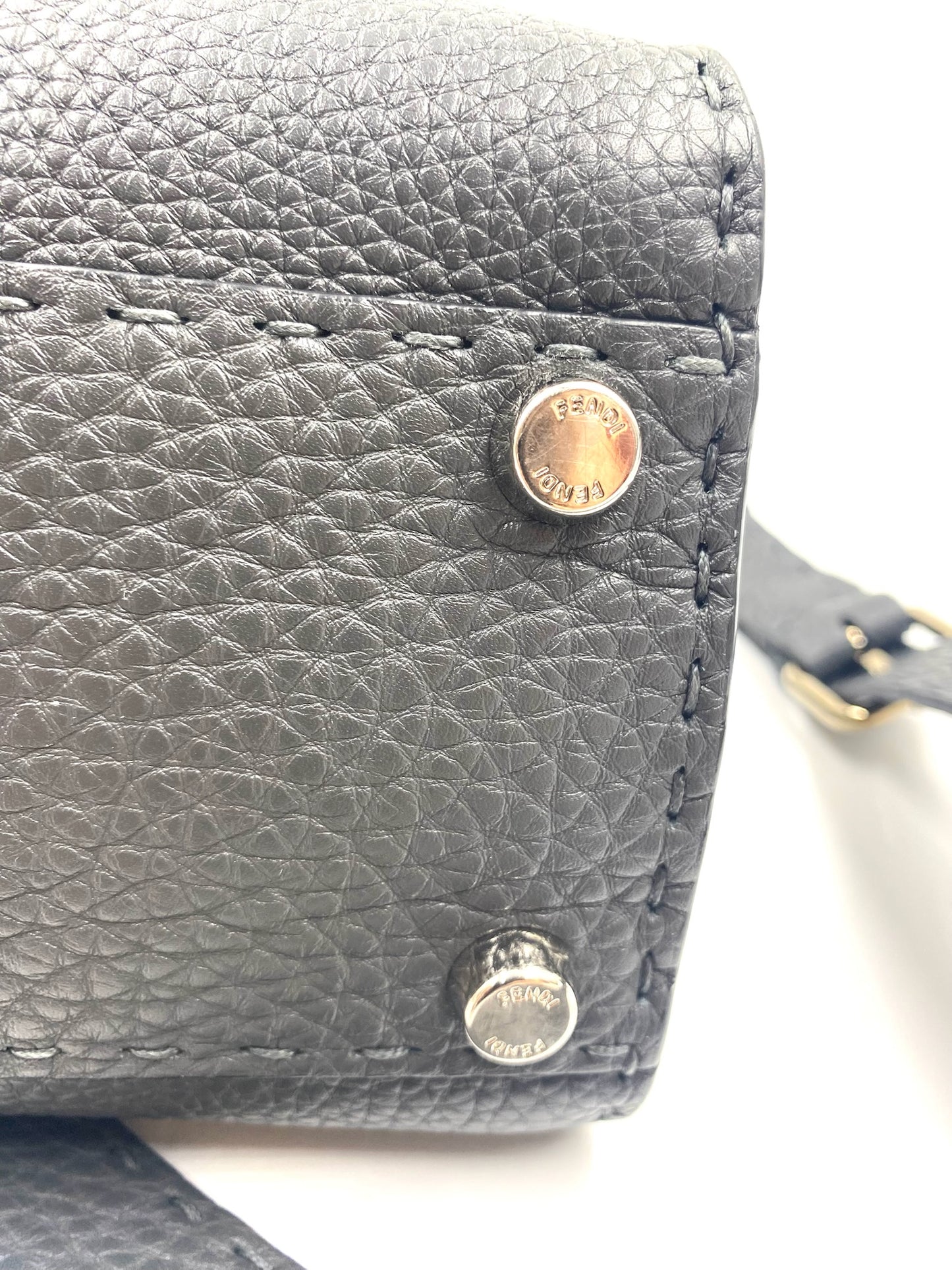 Close-up of Fendi Grey Selleria Leather Peekaboo bag with silver-tone hardware and tonal stitching.