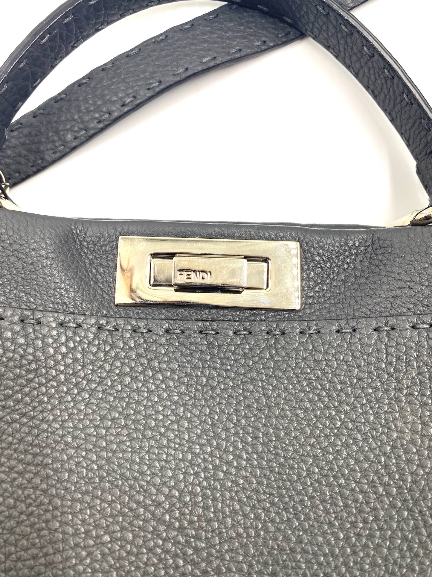 Close-up of Fendi Grey Selleria Leather Peekaboo Shoulder Bag with silver-tone turnstile lock and tonal stitching.