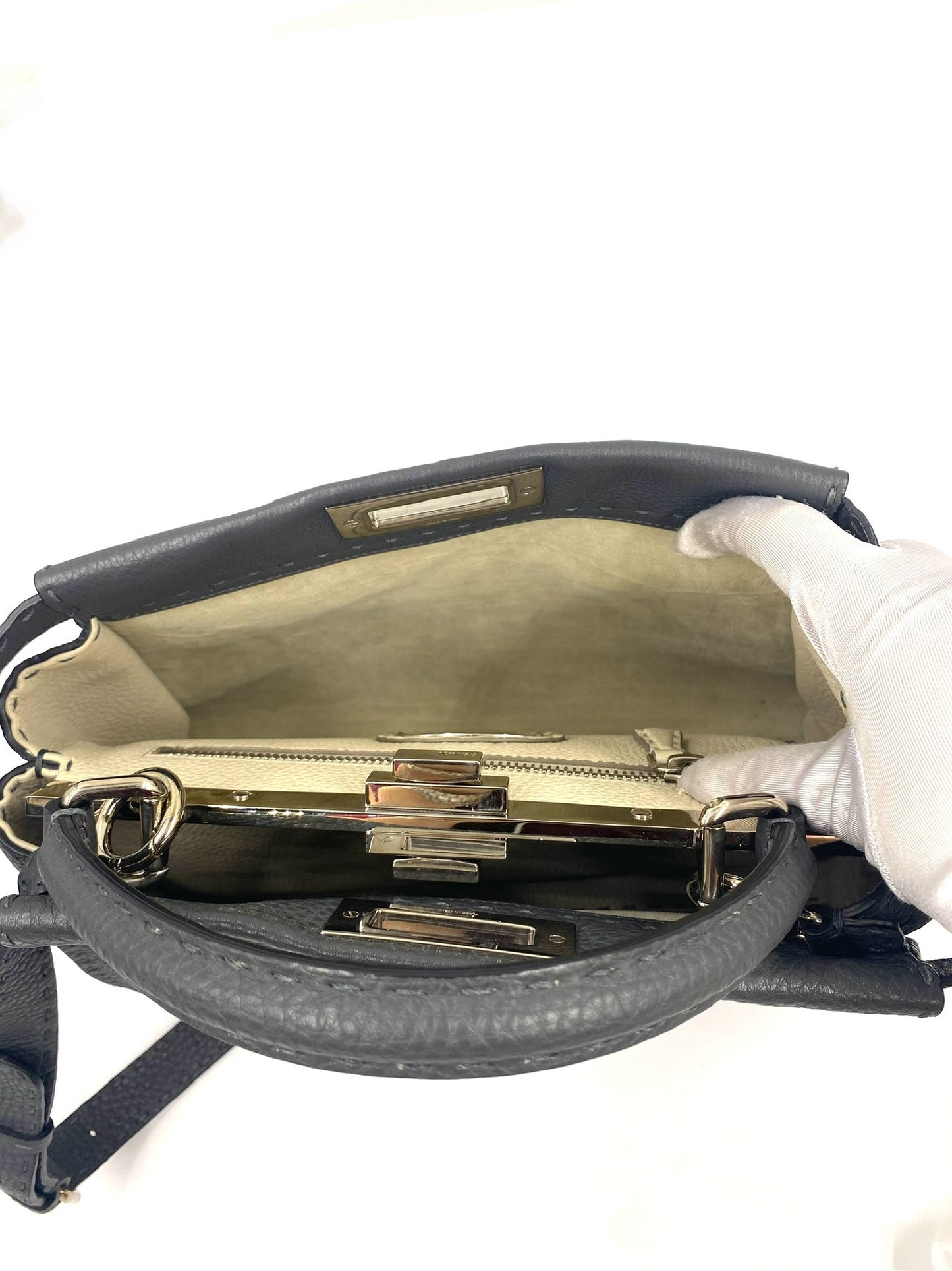 Open Fendi Grey Selleria Leather Peekaboo shoulder bag showing interior, silver hardware, and top handles.