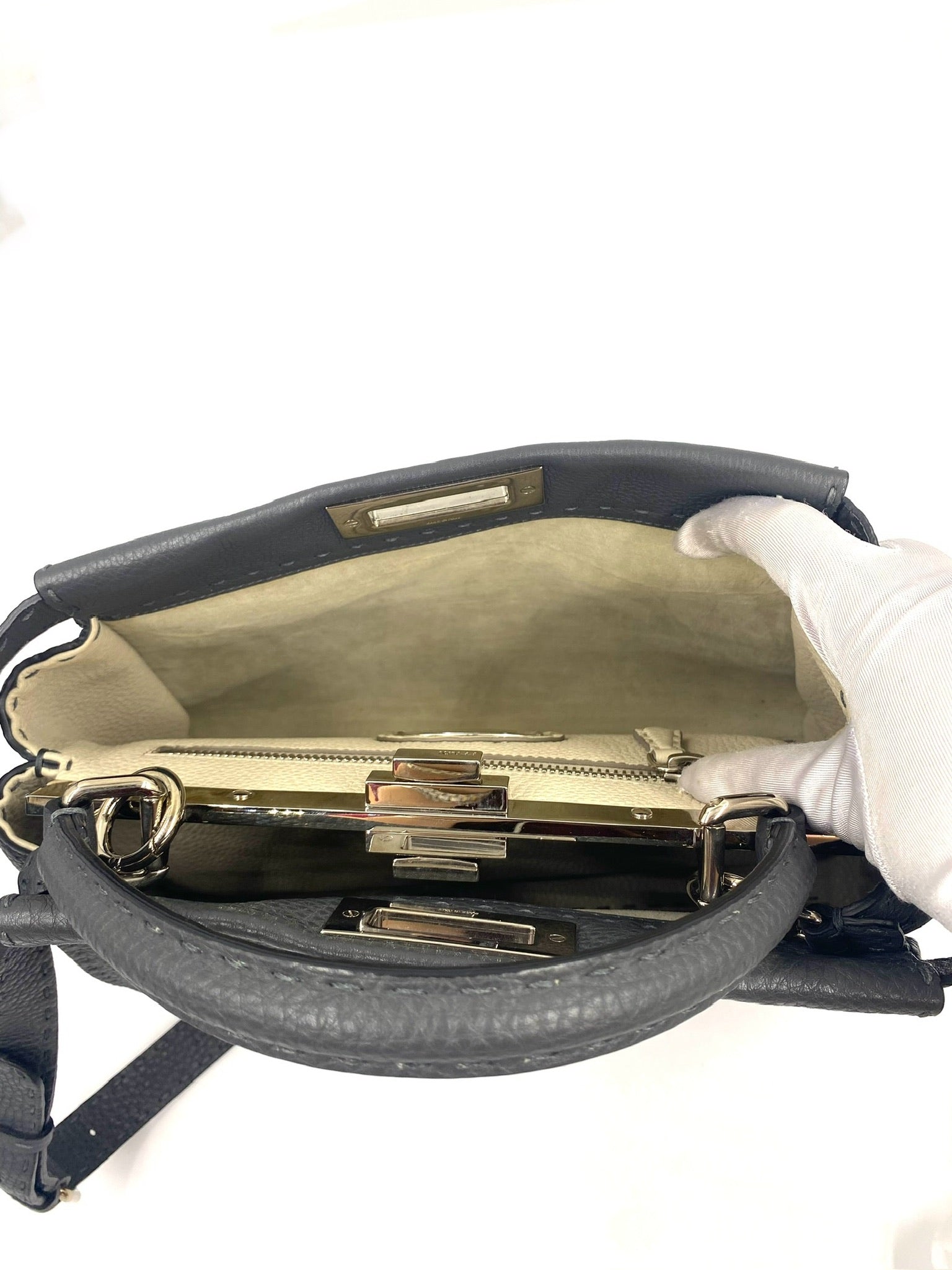 Open Fendi Grey Selleria Leather Peekaboo shoulder bag showing interior, silver hardware, and top handles.