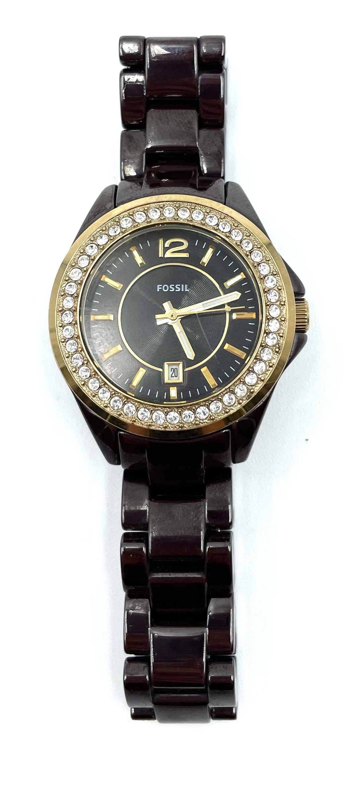 Fossil Tortoise Watch CE1055 with chocolate brown dial, crystal bezel, gold-tone accents, and glossy tortoise-style link bracelet.