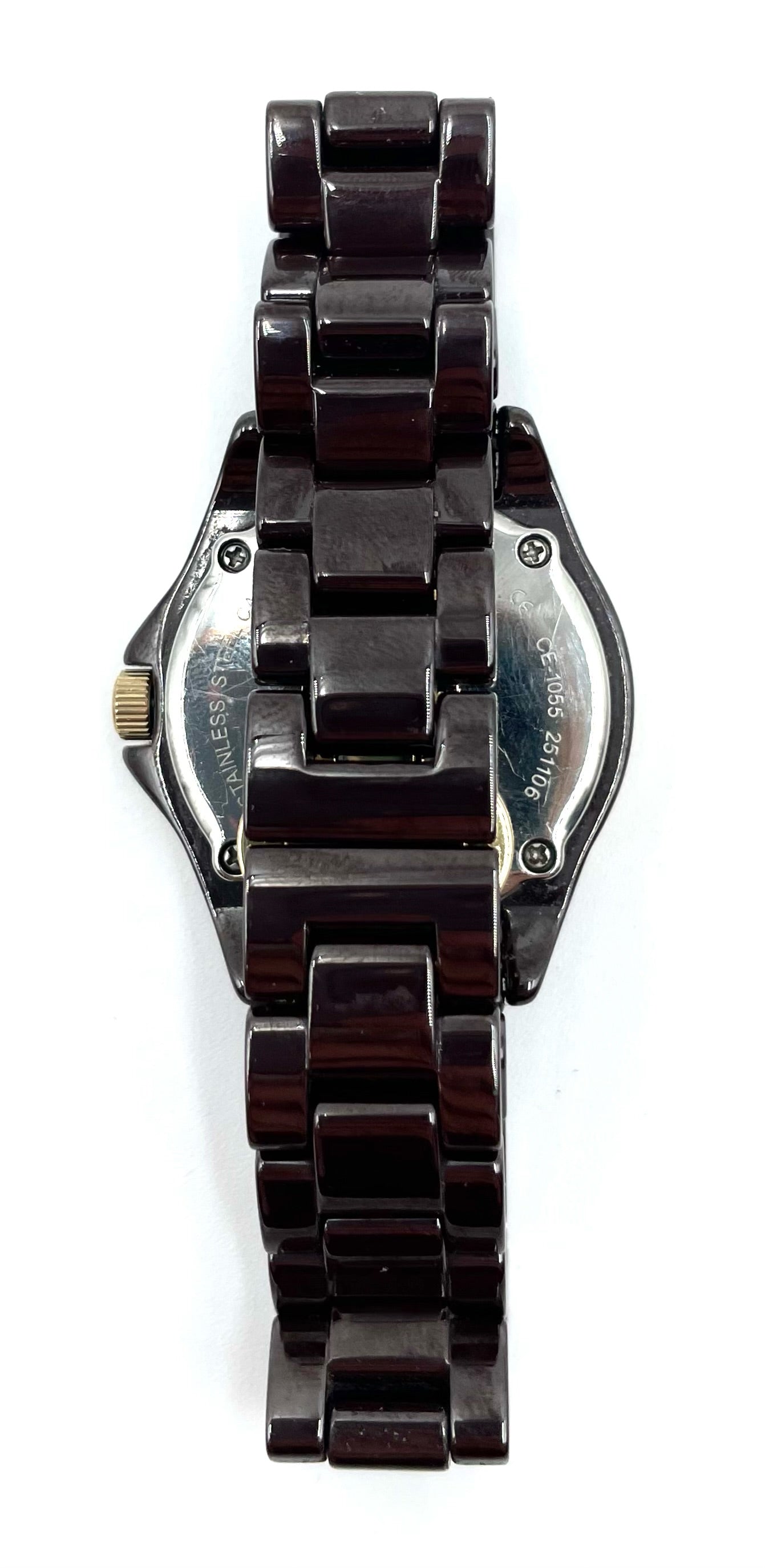 Back of Fossil Tortoise Watch CE1055, showing the glossy tortoise-style link bracelet and stainless steel case.