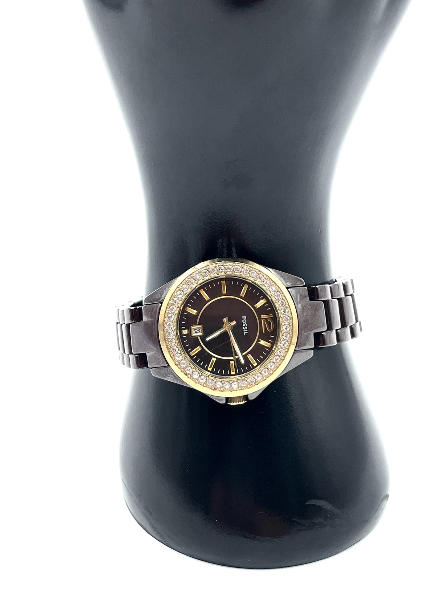 Fossil Tortoise Watch CE1055 with chocolate dial, crystal bezel, gold-tone accents, and glossy tortoise-style link bracelet.