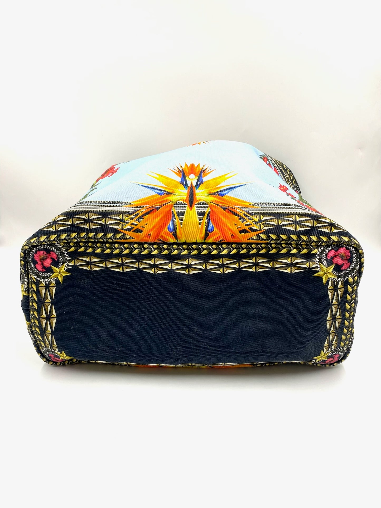 Givenchy Antigona Multicolor Printed Tote with a vibrant bird of paradise design and geometric patterns.