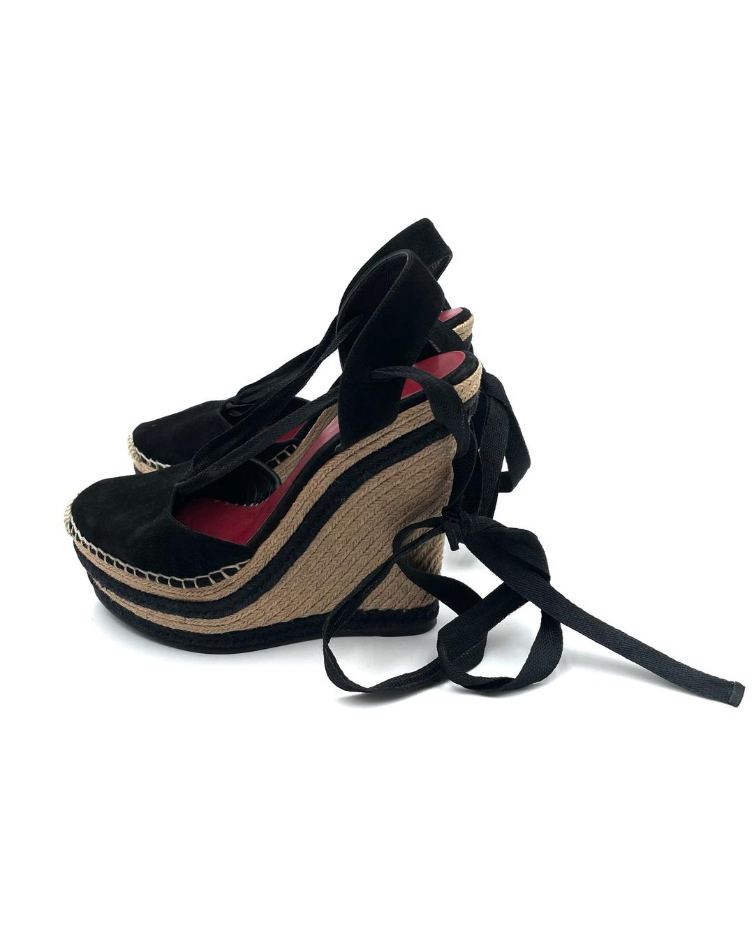Gucci black suede Alexis platform wedge sandals with ankle wrap ties and jute-wrapped soles.