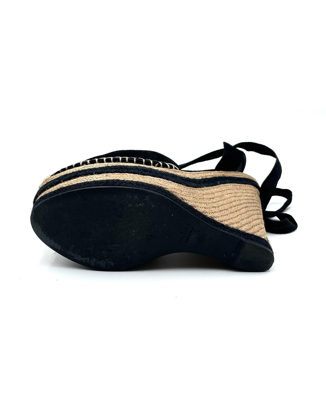 Gucci black suede Alexis platform wedge sandals, size 39.5, featuring a jute-wrapped heel and ankle tie straps.