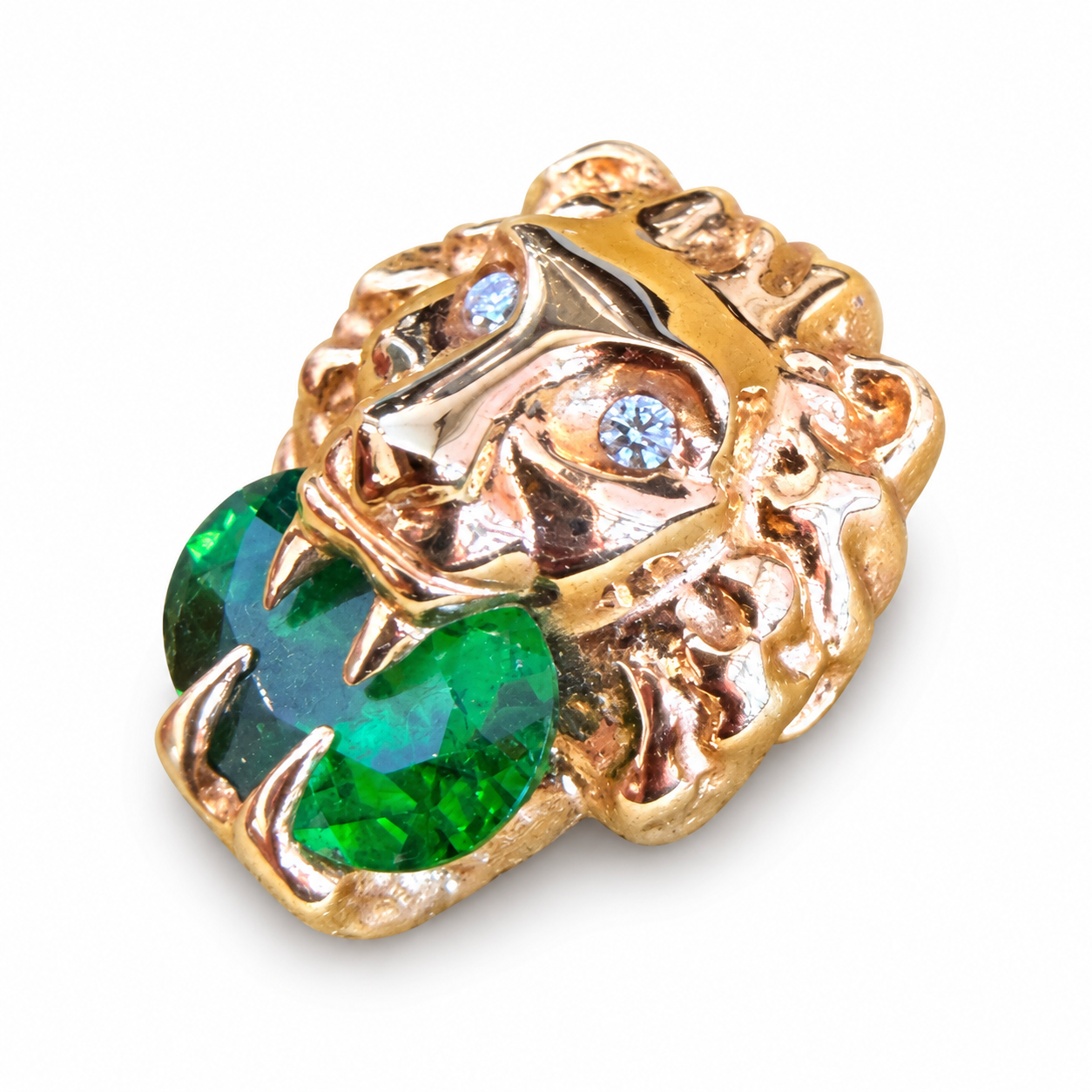 Gucci 18k gold lion head stud earring featuring a green diopside stone and sparkling white diamond eyes.