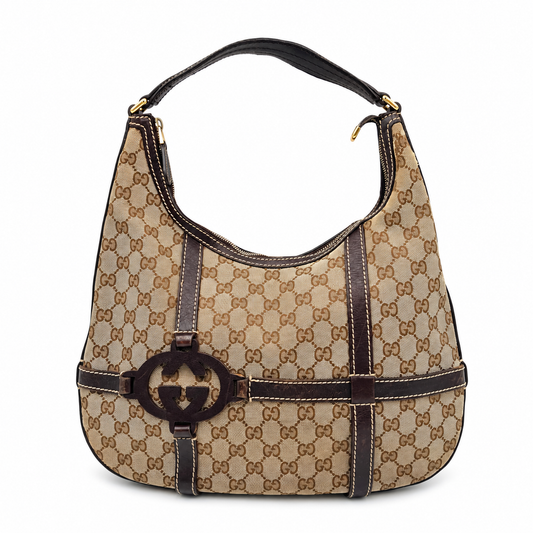 Gucci beige and brown GG canvas hobo bag with dark leather trim and front interlocking G logo detail.
