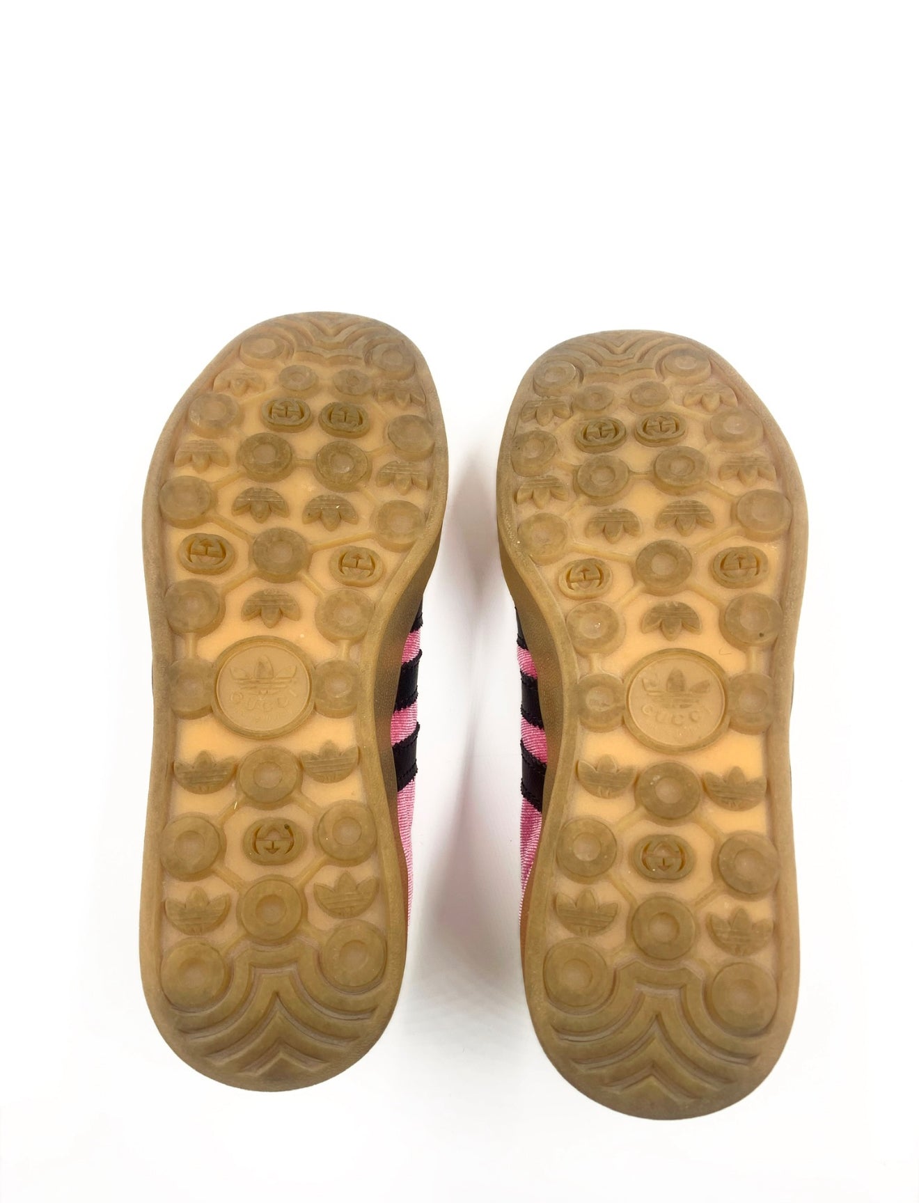 Gucci X Adidas Pink & Green Gazelle sneakers, size 6 women's/5 men's, showing brown rubber soles with logos.