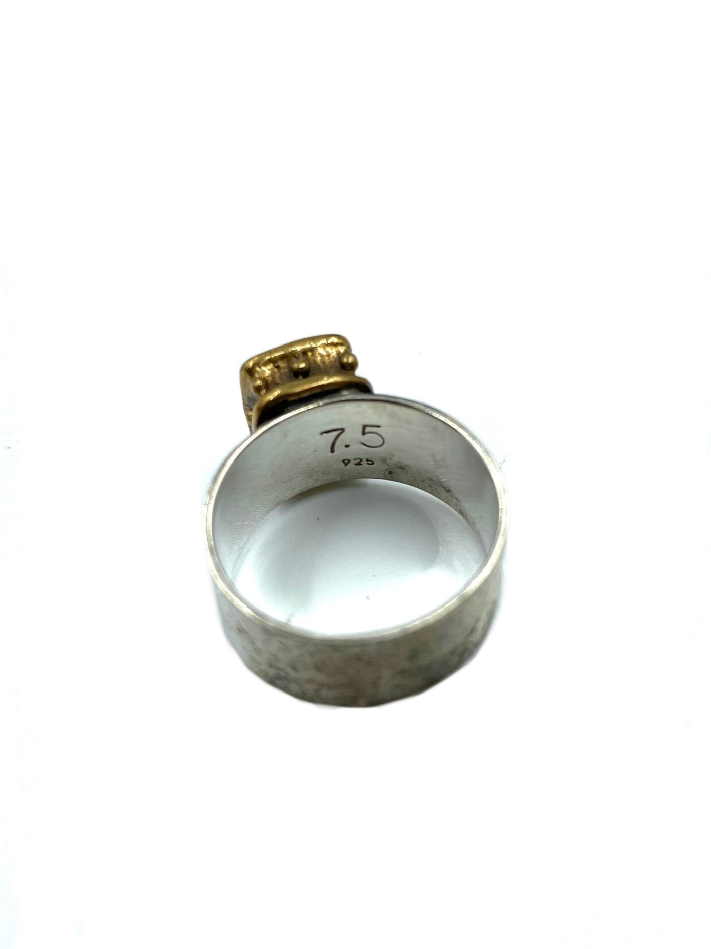 Karyn Chopik Empress sterling silver ring, size 7.5, with a gold-tone bezel and rectangular Cubic Zirconia crystal.