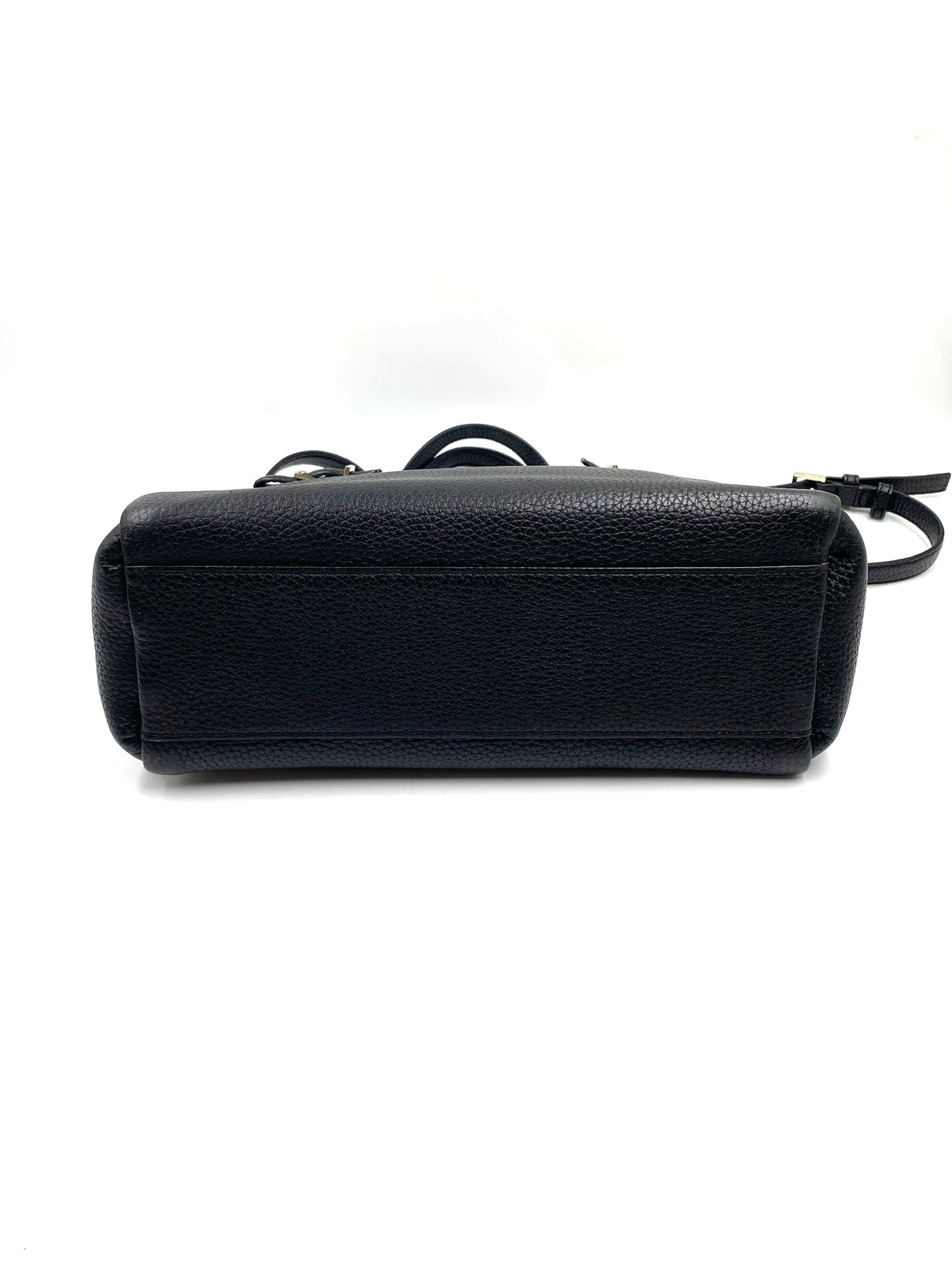 Kate Spade black pebbled leather tote bag, bottom view, with top handles and a detachable strap.