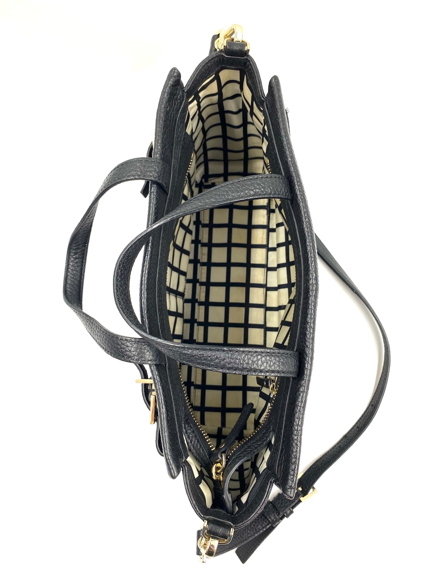 Kate Spade black pebbled leather tote with top handles, gold hardware, and a black and white checkered lining.
