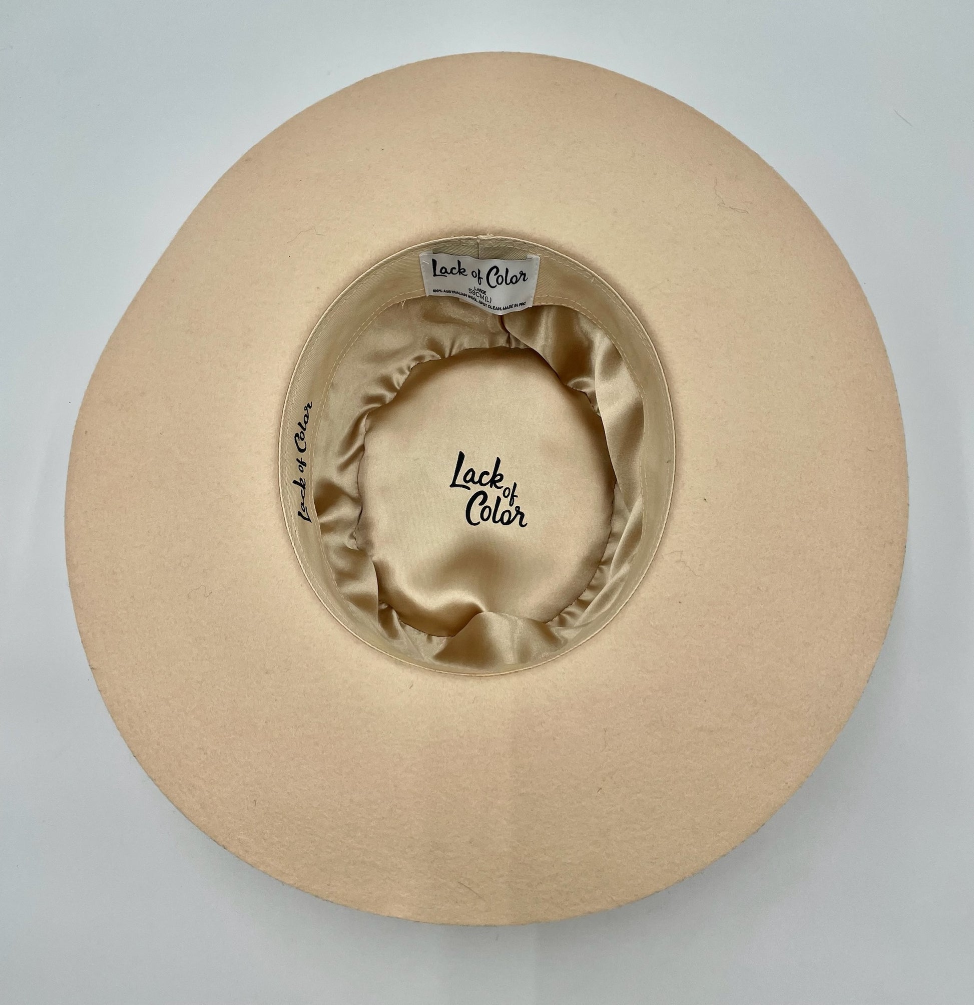 Lack Of Color beige Sierra boater hat, size L 59CM, with a wide brim and satin lining.