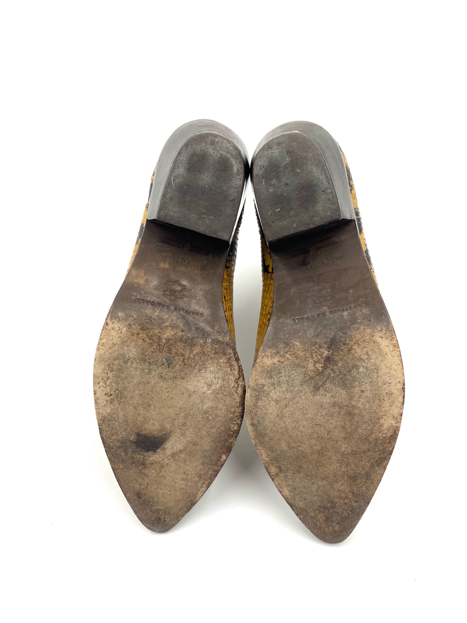 Loeffler Randall snakeskin ankle boots, size 8.5, showing worn soles and heels.