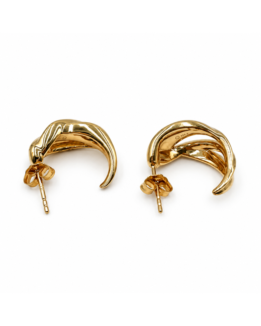 Mejuri gold-filled curved dome hoop earrings with a polished finish and post-back closure on a white background.