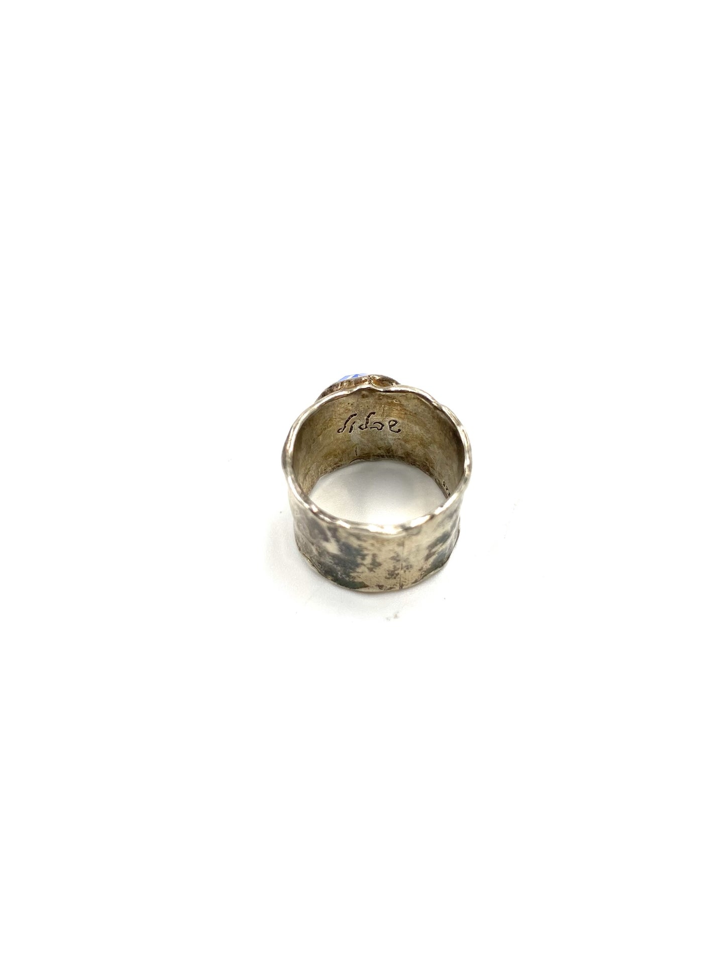 Chunky sterling silver ring with a moonstone gem, size 6.75, showing the inner band.