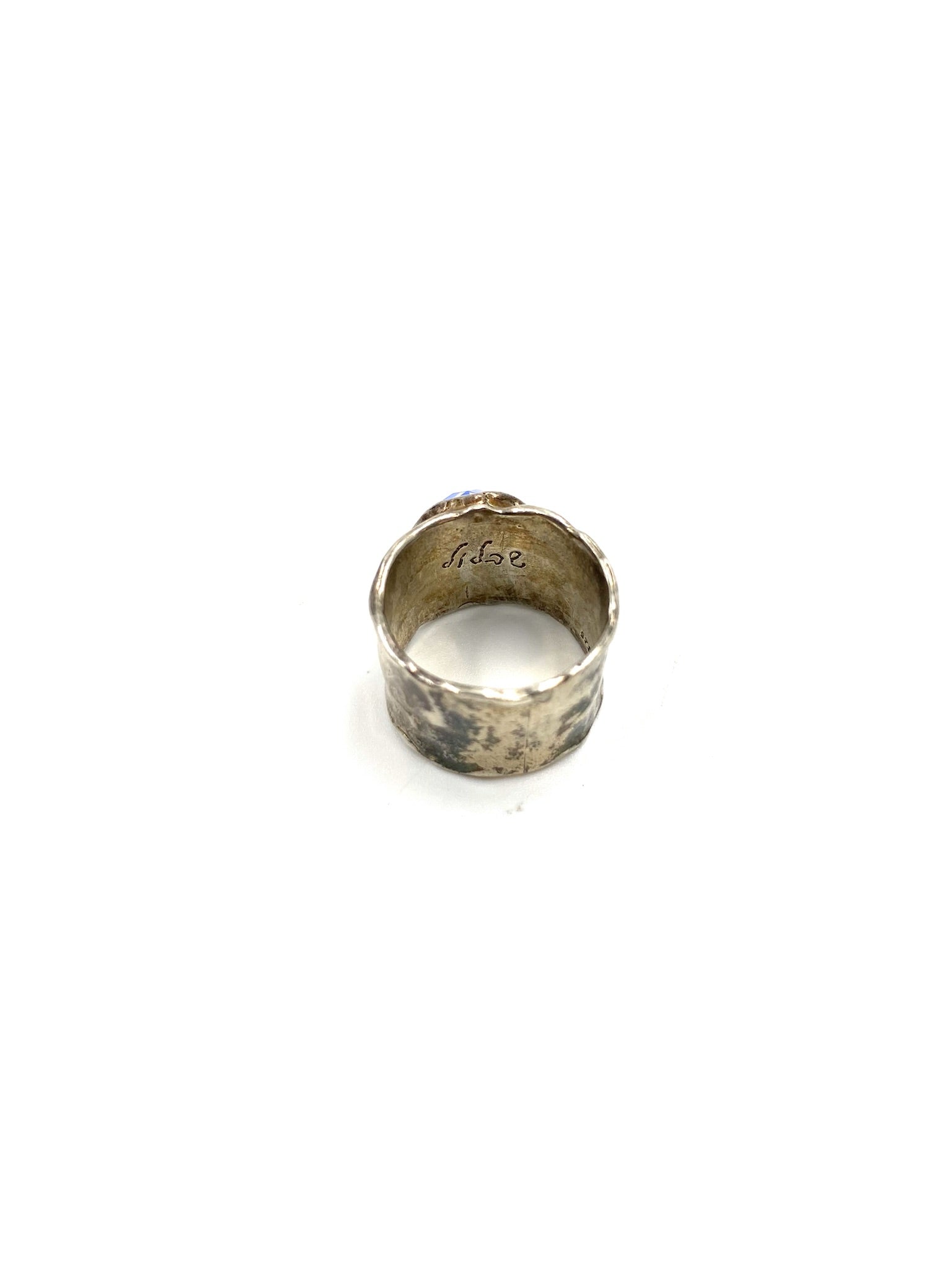 Chunky sterling silver ring with a moonstone gem, size 6.75, showing the inner band.