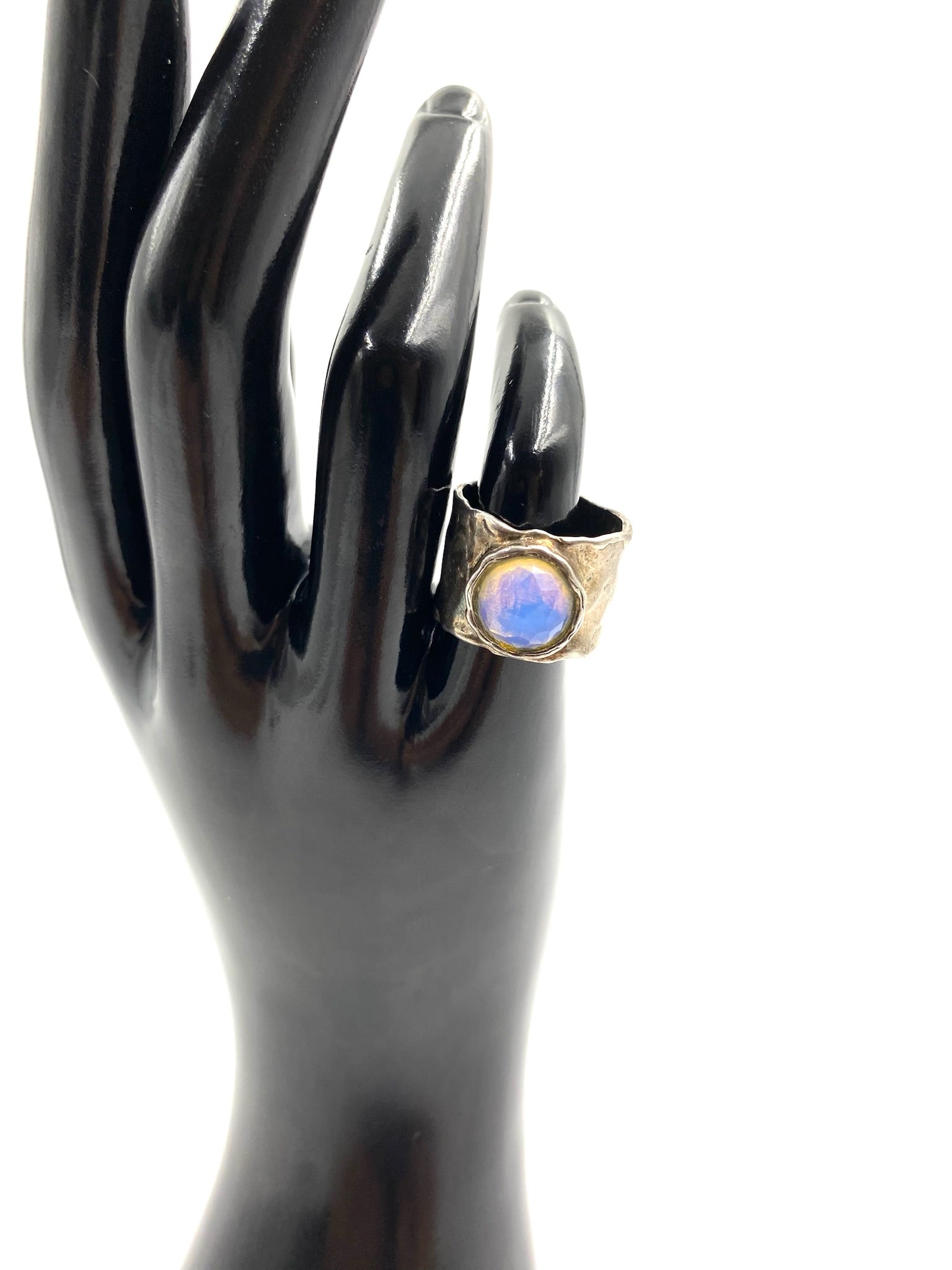 Moonstone sterling silver ring, size 6.75, with an oval iridescent moonstone on a chunky silver band.