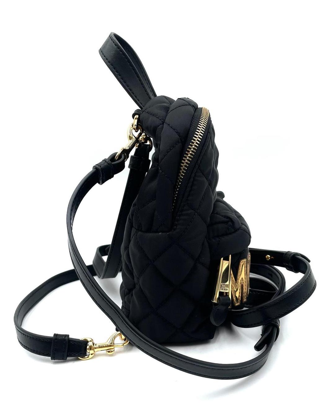 Black quilted nylon Moschino mini backpack with gold-tone logo hardware and detachable shoulder straps.
